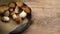 Fresh forest mushrooms, Boletus edulis king bolete,  penny bun, cep, porcini in an old bowl, plate on the wooden dark brown
