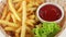 Fresh fried french fries with ketchup (loop)