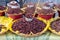 Fresh fried and salted grasshoppers from Oaxaca (translation: chapulines) displayed on a table