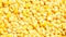 Fresh frozen corn background, Stocking up vegetables for winter storage, Tasty yellow grains of corn. texture of popcorn