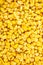 Fresh frozen corn background, Stocking up vegetables for winter storage, Tasty yellow grains of corn. texture of popcorn