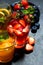 Fresh fruit lemonades in assortment on dark background, top view