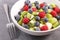 Fresh fruit salad with berry, banana and kiwi- healthy eating
