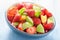 Fresh fruit salad with strawberry, apple, nectarine, pomegranate