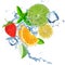 Fresh fruit in water splash over white