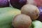 Fresh Fruits Background. Close Up Of Plums,, Mango, Apples And Kiwifruit