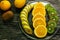 Fresh fruits banana, kiwi, orange on wooden background. Healthy food. A mix of fresh fruit. Group of citrus fruits. Vegetarian raw