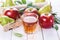 Fresh fruits and juice over white background