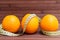 Fresh fruits orange wrapped in a centimeter.