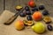 Fresh fruits on rustic wooden background: peaches