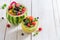 Fresh fruits salad in watermelon in summer kitchen