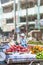 Fresh fruits in a stall on the street of Tarchileik township, people, vehicle and building backgrounds. Tarchileik is a border