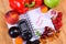 Fresh fruits and vegetables with glucose meter and notebook for notes