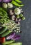 Fresh garden vegetables food background. Red cabbage, zucchini, peppers, beets, beans, squashes, garlic on dark background, top vi