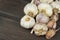 Fresh garlic on a wooden background. Traditional aromatic ingredients in food.