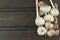 Fresh garlic on a wooden background. Traditional aromatic ingredients in food.