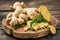 Fresh ginger arrangement on wooden table creates an inviting and appetizing scene