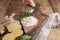 Fresh ginger with leaves and ground into flour on wooden background. Food for health and beauty. Free space for text. Copy space
