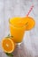 Fresh Glass of Orange Juice With Heart Straw