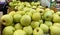 Fresh Golden Delicious juicy whole apples for sale in a store in boxes