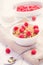 Fresh granola breakfast with raspberries and honey