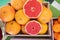 Fresh grapefruit in a box at an agricultural exhibition