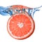 Fresh grapefruit dropped into water