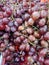 Fresh grapes, purple skin, sweet, sour taste. Fruits contain lots of vitamins.