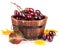 Fresh grapes in wooden basket with yellow leaf