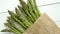 Fresh green asparagus in a brown paper bag. Healthy eating concept. Food for vegetarians