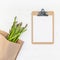 Fresh green asparagus with paper clipboard mockup