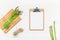 Fresh green asparagus with paper clipboard mockup