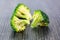 Fresh green broccoli on wood background close up