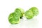 The Fresh green brussel sprouts vegetable on white background