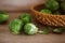 Fresh green brussel sprouts vegetable on a wooden brown table , Healthy fresh vegetable concept