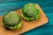 Fresh green burger on green background