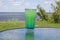 Fresh green cold drink Part of a big glassful on the table