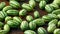 Fresh green Cucamelon on rustic wooden table