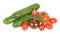 Fresh green cucumbers, different red tomatoes and bundle of green dill leaves isolated on white background