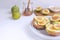 Fresh green figs Wooden cutboard Wholegrain bread Honey Goat che