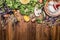 Fresh green kale and vegetables ingredients for cooking on rustic wooden background