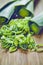 Fresh green leek vegetables on the wooden board