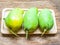 Fresh Green mango (Rhino Mango) on wood background