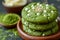 Fresh Green Matcha Cookies Sprinkled with Sesame Seeds on Wooden Plate with Matcha Powder in Background