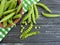 Fresh green pea dish a towel ingredient grain nutrient vegetarian on a black wooden background