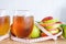 Fresh green and red apple slice and juice glasses with measuring tape