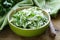 Fresh green salad with cabbage (coleslaw), cucumber and parsley