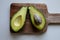 .Fresh green vegetables ready on cutting board, avocado,Cucumbers, Chia seed served in a bawl for breakfast. Gluten free meal,