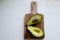 .Fresh green vegetables ready on cutting board, avocado,Cucumbers, Chia seed served in a bawl for breakfast. Gluten free meal,