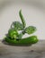 Fresh green vegetables and on the table. Balancing composition. Poster, banner, advertisement